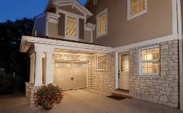 Gallery Steel Short Panel with Clayton Windows in Almond and complementing Rustic Entry Door